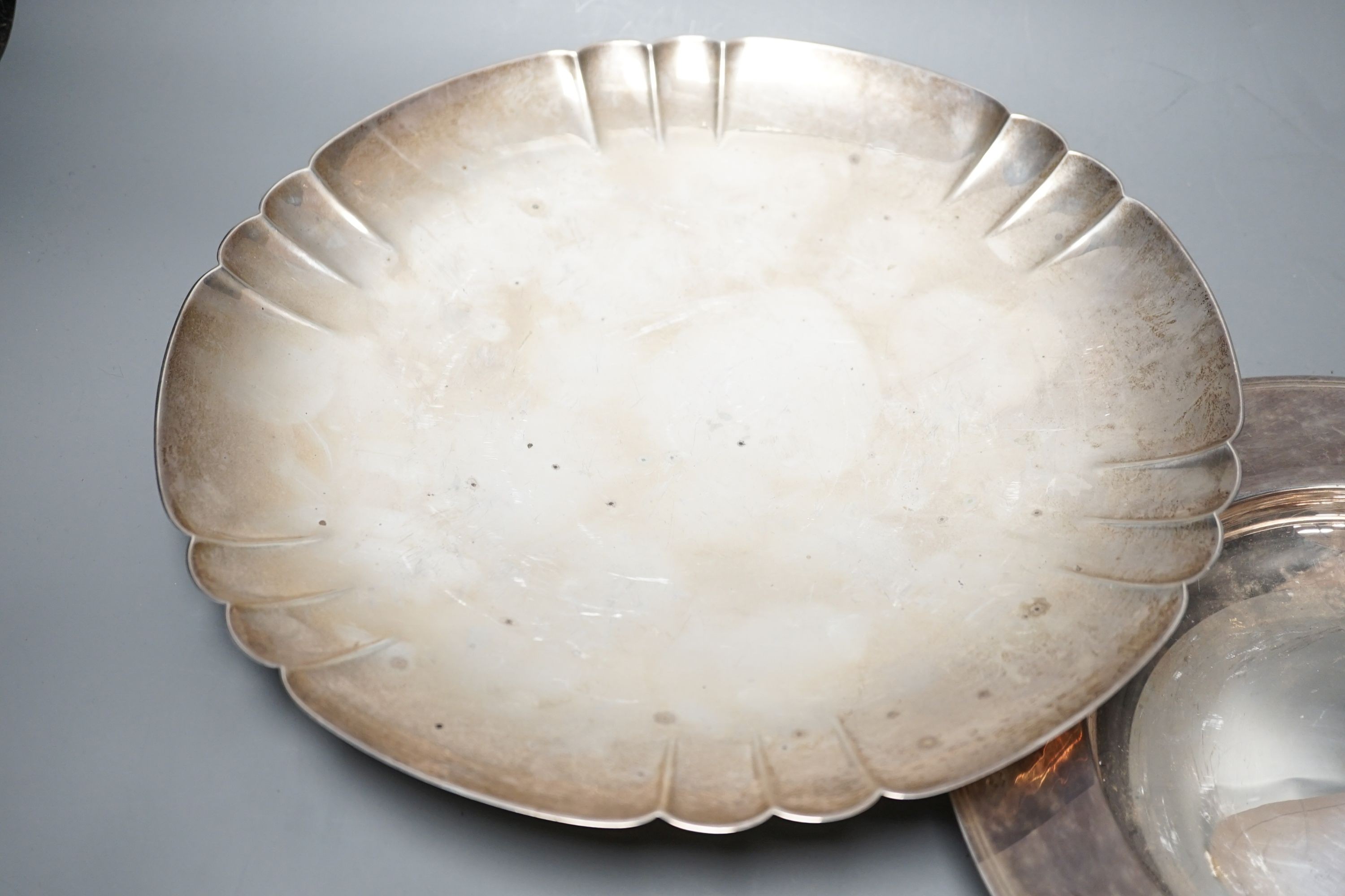 A 1930's silver shallow dish, by Edward Barnard & Sons Ltd, 30.4cm and a later modern silver armada dish, 25.4cm